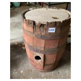 WOODEN BARREL W/ METAL HOOPS AND SIDE BUNG HOLE.