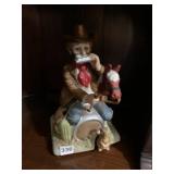 MELODY IN MOTION PORCELAIN CLOWN FIGURINE,