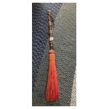 WOODEN DANCE WAND, TURNED HANDLE, RED FIBER