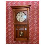 HOWARD MILLER WALL CLOCK, OAK CASE, GLASS FRONT,