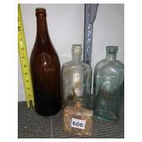 ASSORTED GLASS BOTTLES, INCLUDES AMBER BREWERY