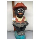 PAINTED COMPOSITION FIGURINE, BOY IN OVERALLS AND