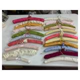 ASSORTED SATIN-COVERED CLOTHING HANGERS, INCLUDES
