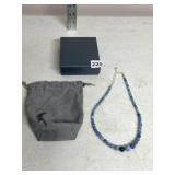BEADED NECKLACE, GRADUATED BLUE STONE BEADS,