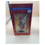COLLECTIBLE ANGEL FIGURINE, WINGED FIGURE HOLDING