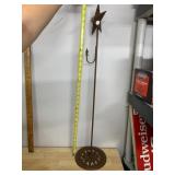 METAL STAR-THEMED DISPLAY STAND, CAST IRON BASE,