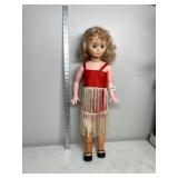 VINYL DOLL, BLONDE HAIR, BLUE EYES, RED FRINGE