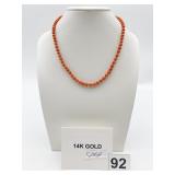 CORAL BEAD NECKLACE, STAMPED 14K GOLD CLASP, 2.1