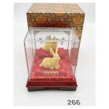 RABBIT FIGURINE, RESIN CONSTRUCTION, DISPLAYED IN