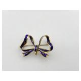 18K GOLD BOW BROOCH, BLUE ENAMEL, GOLD SCROLL