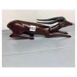 HAND-CARVED WOODEN GAZELLE FIGURINE, RECLINING