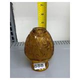 AMBER GLASS COVERED JAR, PRESSED FLORAL PATTERN,
