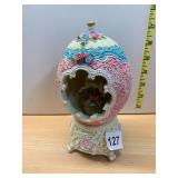 MUSICAL EGG, CAROUSEL THEME, RESIN CONSTRUCTION,