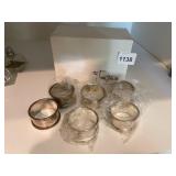 THE TONES STORE CO. SILVER-TONE NAPKIN RINGS,