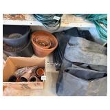 INCLUDES TERRACOTTA POTS, PLASTIC PLANTERS, BLACK