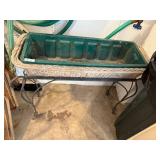 WICKER AND METAL PLANT STAND, GREEN PLASTIC
