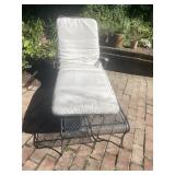 WROUGHT IRON CHAISE LOUNGE, FLORAL MOTIF ARMS,