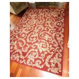 RUG MACHINE MADE RED/ RUST WITH GOLD 91" X 65 1/2"