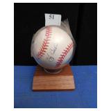 ONE BASBEBALL SIGNED YOGI BERRA; IN CASED IN