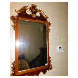 WOOD MIRROR WITH GOLD TRIM AND SCROLL TOP
