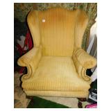 GOLD WING CHAIR CLEAN WITH CARVED WOOD LEGS