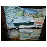 TWO SHELVES OF SHEETS AND PILLOW CASES