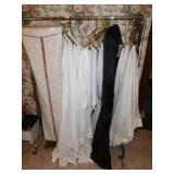ROLLING CLOTHING RACK AND DRAPRIES