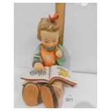 GOEBEL FIGURINE GIRL READING BOOK; MEASURES 9.5"