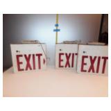 THREE USED EXIT SIGNS