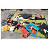 UNDER BED STORAGE FILLED WITH HALLOWEEN COSTUMES: