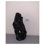 Carved Ebony 8 figures climbing to the top