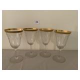 Set of 4 gold rim glasses