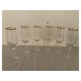 6 gold rim Champagne glasses