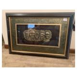 Shadow box frame, raised figures