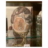 Porcelain Animal Motif Egg with metal pedestal