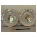 Petrossian Sloted spoon and two Lenox 8" plates