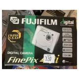 Olympus Stylus 1050 SW camera and Fuji Fine Pix 40