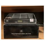 Sharper Image Power recharging station w/ clock