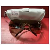 Christian Dior Brown with copper tone sides and