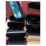 Oscar de Larenta case and 2 Versace