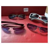 Four pairs of Sunglasses