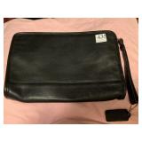 Coach Black leather 8" H x 11" W with wrist strap