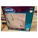 New Toilet seat raiser in box