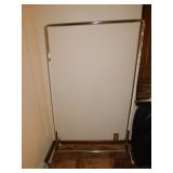 Rolling clothing rack