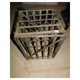 Wine cage holds 16 bottles