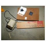 Wine bottler transporter, Vivitar charger, Camera