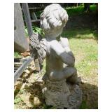 CEMENT STATUE CHIP ON BACK BOTTOM