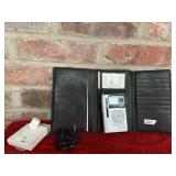 Grinding travel radio in original holder Germany