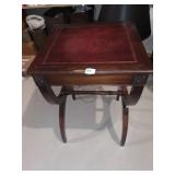 MAHOGANY LEATHER TOP STAND RUBBING ON EDGE