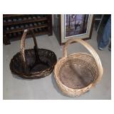 TWO LARGE BASKET 1 LIGHT ONE DARK WITH WOOD EASEL